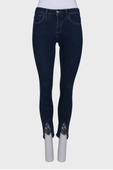 Jeans with slit and lace front