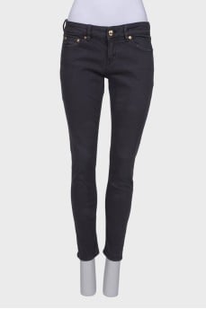 Gray jeans with gold hardware