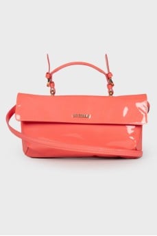 Lacquered pink clutch bag