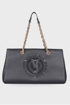 Black leather bag with brand logo