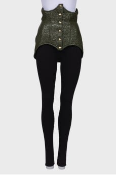Green lacquered corset with press-studs