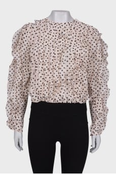 Polka dot blouse with ruffles