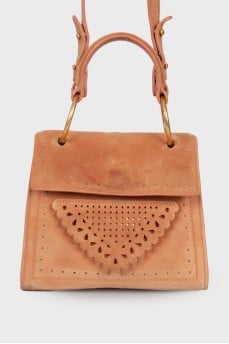 Perforated suede bag