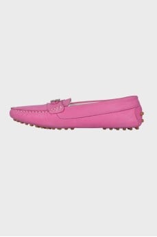 Hot pink moccasins with brand logo