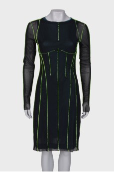 Dress with a decorated seam