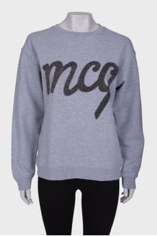 Gray sweatshirt with brand logo