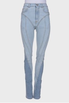 Light blue jeans with raised seams