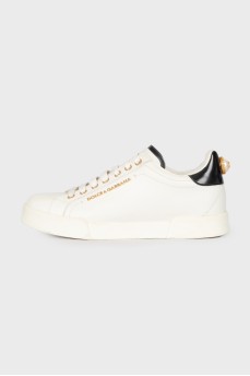 White sneakers with brand logo