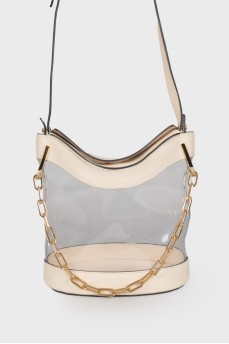 Transparent bag with golden hardware