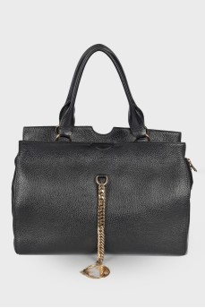 Leather bag with golden keyring