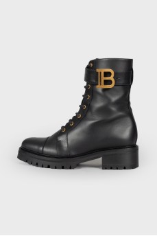 Leather boots with gold-tone hardware