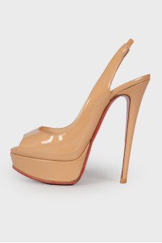 Open heel patent leather shoes