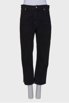 Black jeans with raw seams