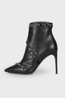 Leather ankle boots decorated with rhinestones