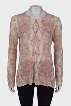 White jumper in pink and gray print