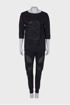 Suit with rhinestones in the shape of a skull