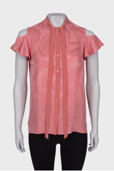 Pink sleeveless blouse
