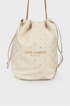 White bag in golden print