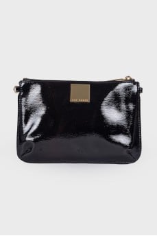 Lacquered black zip clutch