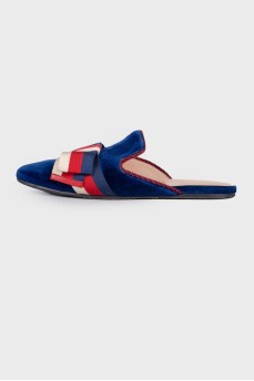Textile mules decorated with a bow