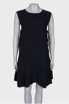 Navy blue dress with lace at the hem
