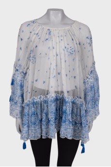 White blouse in blue floral print