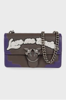Leather bag with patch