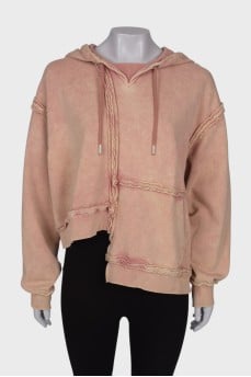 Sweatshirt with asymmetric cut, with a hood