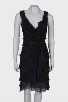 Black dress with a pattern and frills