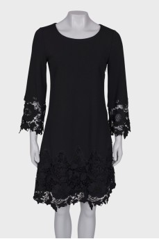 Black dress with lace at the hem