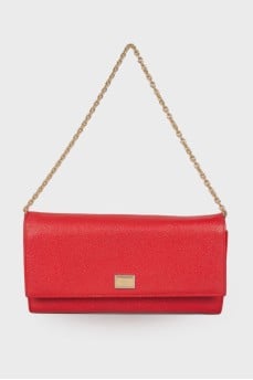 Red embossed clutch