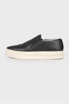 Perforated leather slip-ons