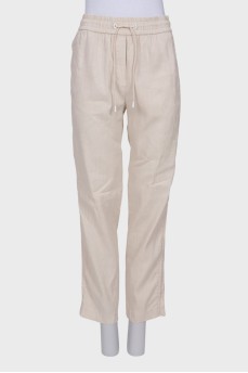Beige elastic trousers