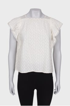 T-shirt with embossed pattern and tag