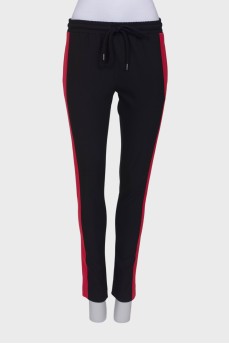 Black trousers with stripes