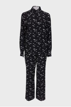 Black suit in white print with tag