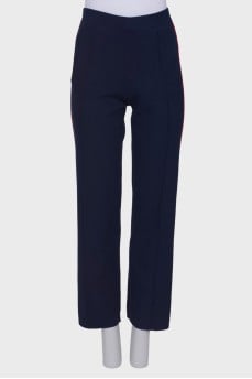 Knitted trousers with red stripes