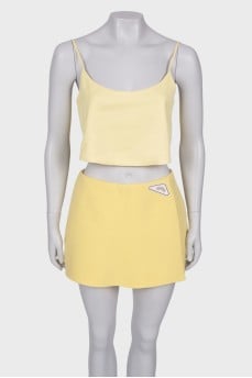 Yellow suit top and shorts