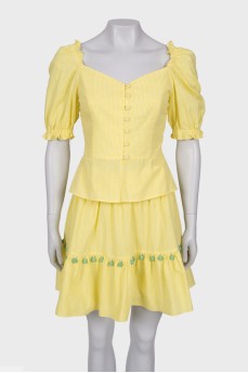 Yellow blouse and skirt suit