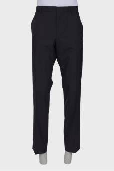 Men's classic black trousers with a tag