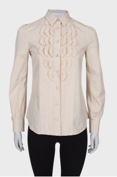 Light beige blouse with ruffles