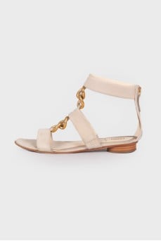 Suede sandals with golden chain