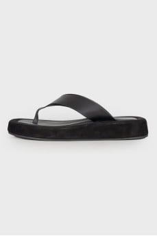 Black leather slippers