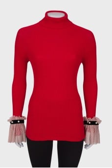 Golf with lace ruffles on the cuffs