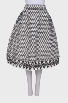 Black and white skirt with tag pockets