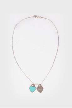 Silver pendant in the shape of two hearts