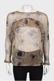 Sheer blouse with ruffles