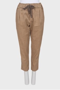 Golden trousers in cotton and linen
