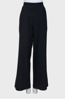 Dark green loose fit trousers