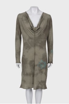 Green dress with embroidered print